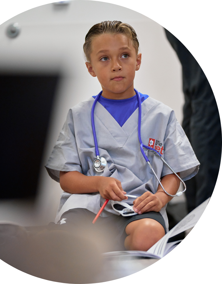 boy participating in little vets